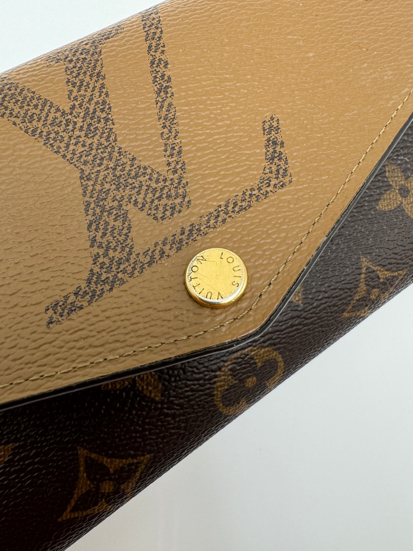 LOUIS VUITTON SARAH WALLET REVESE