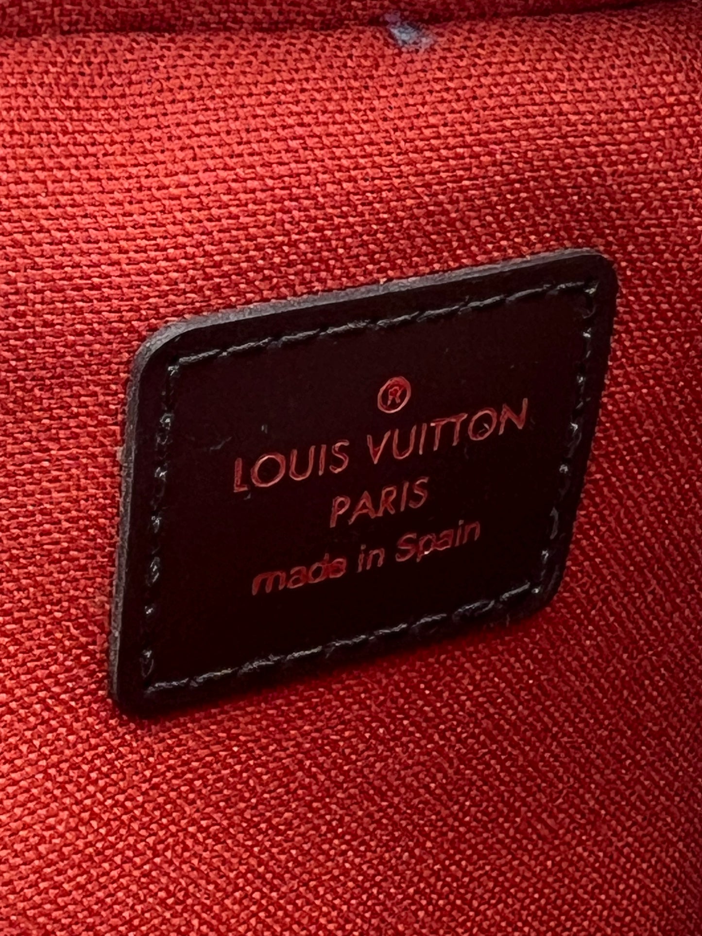 LOUIS VUITTON GERONIMO SLING BAG